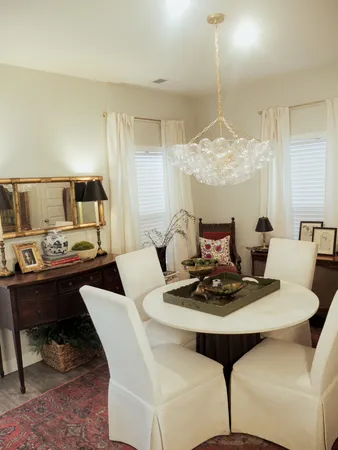 a view of a dining room with furniture