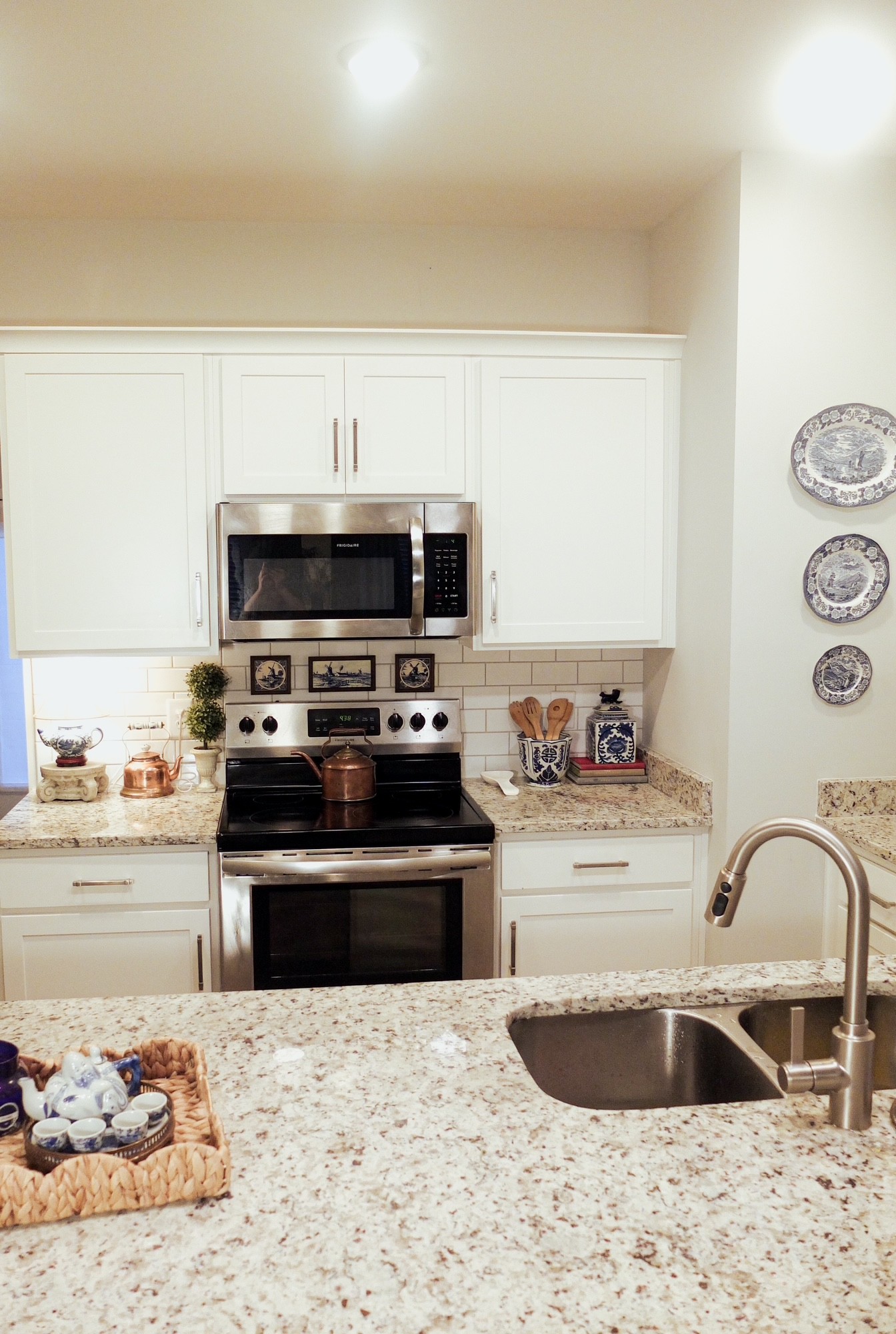 420 Withrow Way Gallatin, TN 37066 - Photo 3 of 18 a kitchen with a stove a sink and a microwave