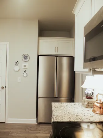 a view of kitchen island wooden floor