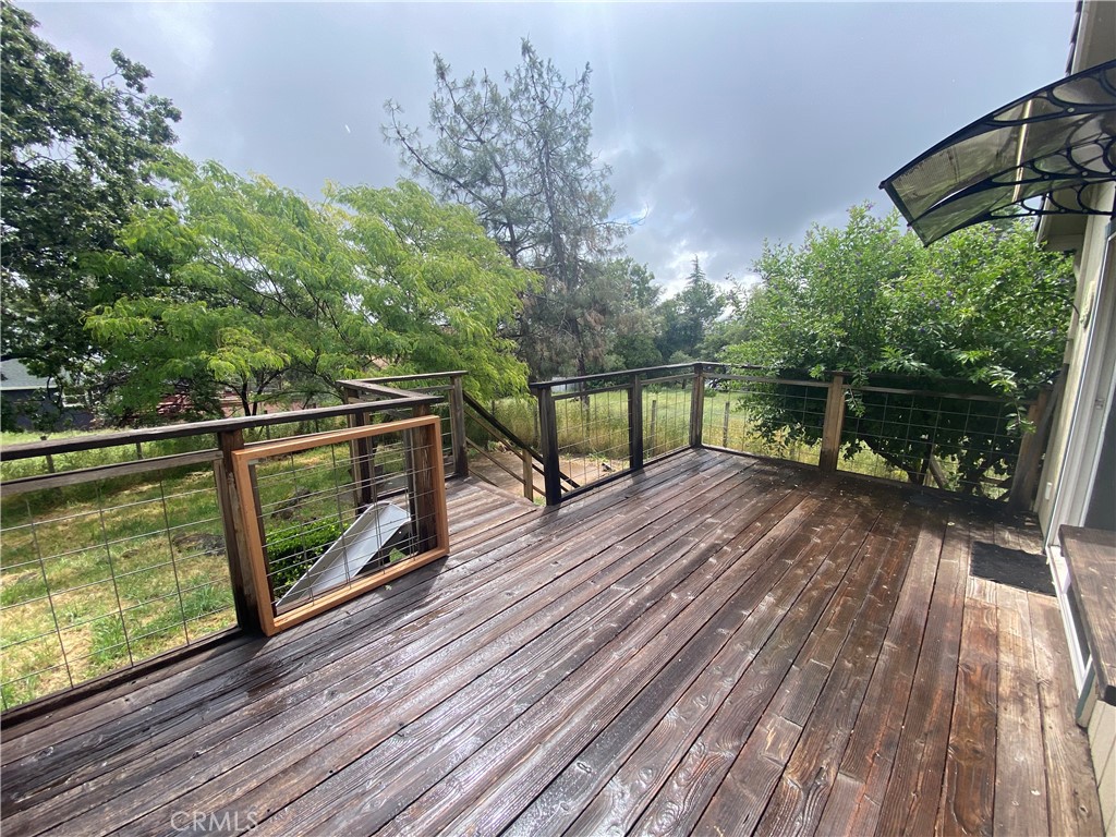 16506 Ridgecrest Court Hidden Valley Lake, CA 95467 - Photo 21 of 25 a view of outdoor space with deck and yard