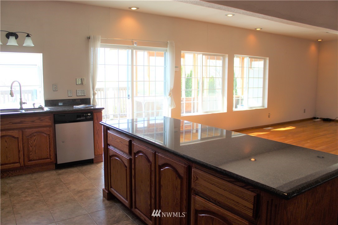 1017 South Sundance Road Othello, WA 99344 - Photo 21 of 34 a view of a kitchen counter space and windows