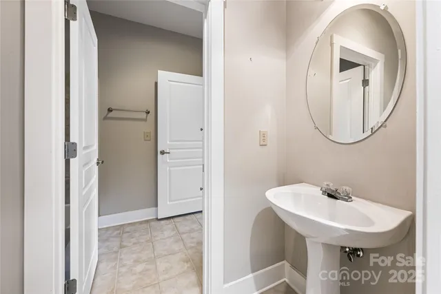 a view of a hallway with washer and dryer