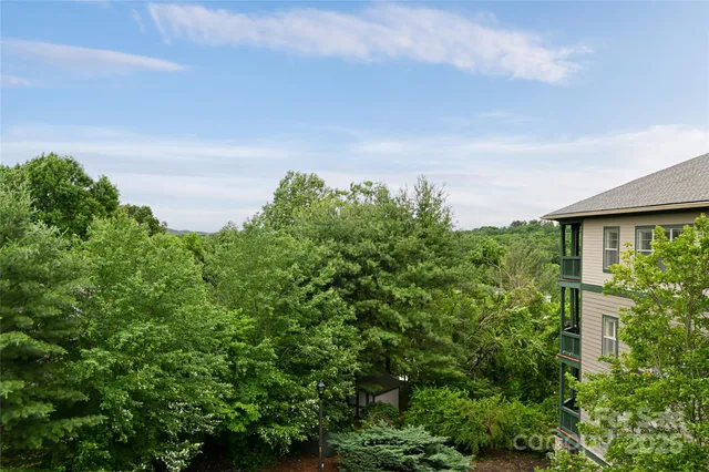 a view of a porch with a small yard