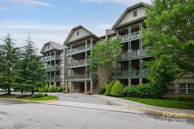 a front view of a building with garden