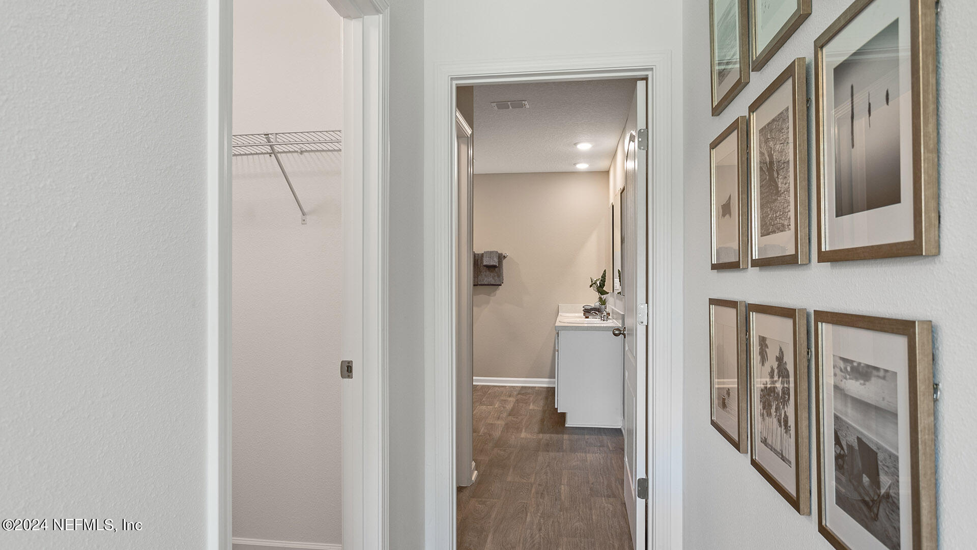 123 Hulett Wds Road Palm Coast, FL 32137 - Photo 15 of 33 a view of a hallway with wooden floor and staircase