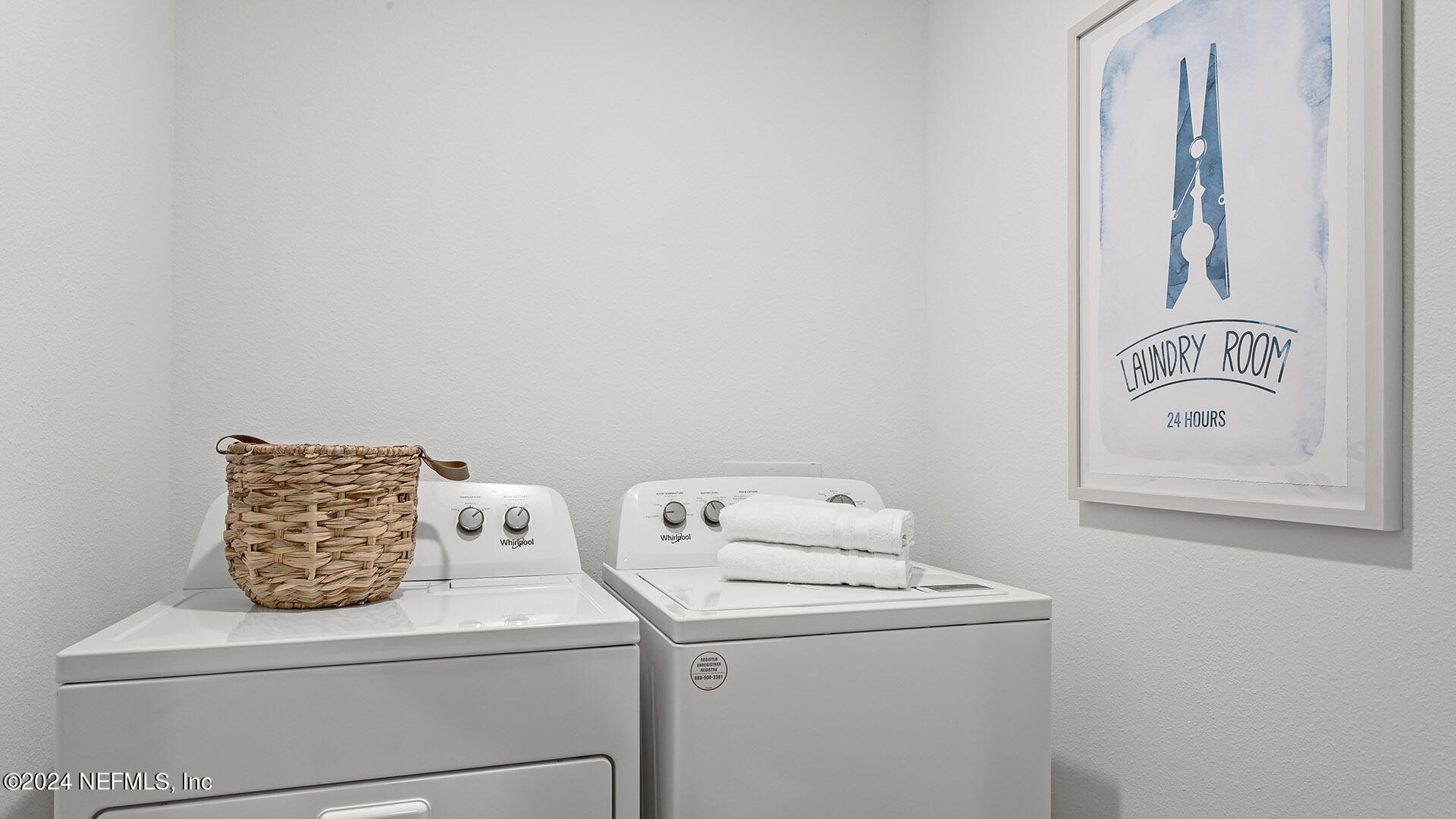 123 Hulett Wds Road Palm Coast, FL 32137 - Photo 19 of 33 a utility room with dryer and washer