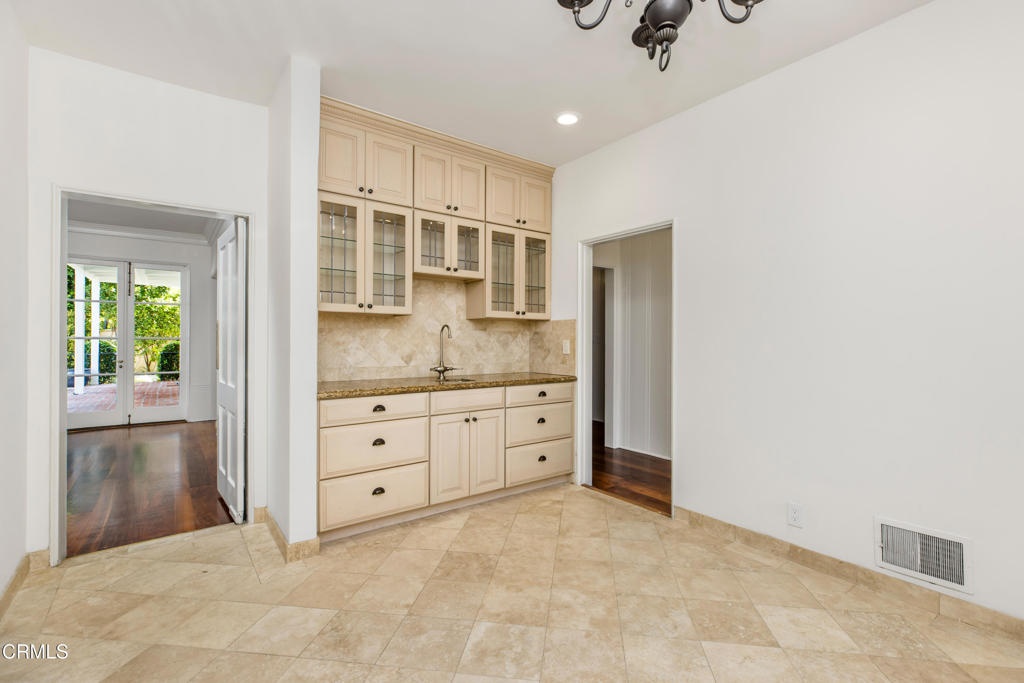 1184 Arden Road Pasadena, CA 91106 - Photo 11 of 62 a spacious bathroom with a granite countertop sink and a mirror