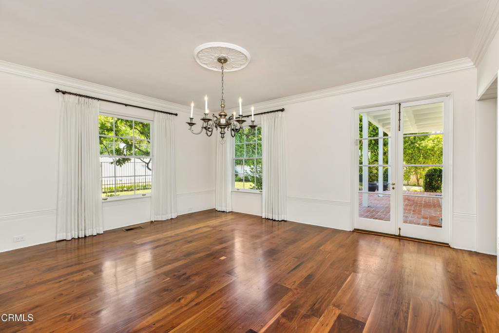 1184 Arden Road Pasadena, CA 91106 - Photo 14 of 62 a view of an empty room with wooden floor and a window