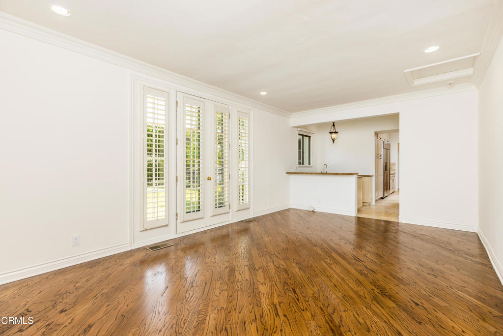 1184 Arden Road Pasadena, CA 91106 - Photo 16 of 62 a view of empty room with wooden floor and fan