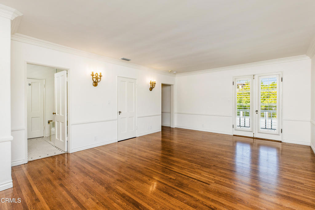 1184 Arden Road Pasadena, CA 91106 - Photo 25 of 62 a view of empty room with wooden floor and fan