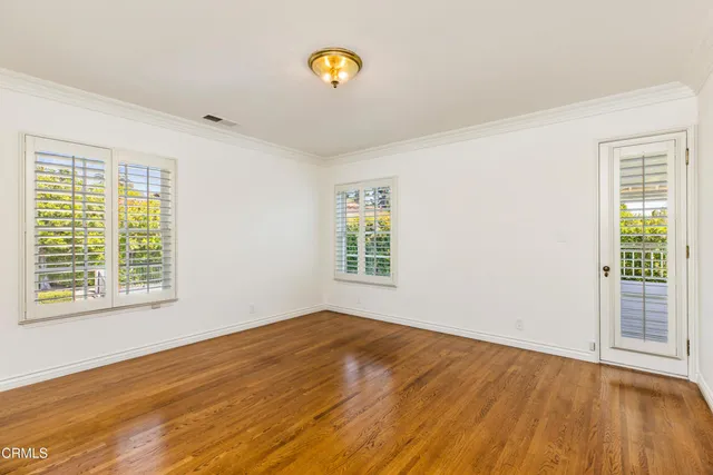 a view of a backyard with furniture