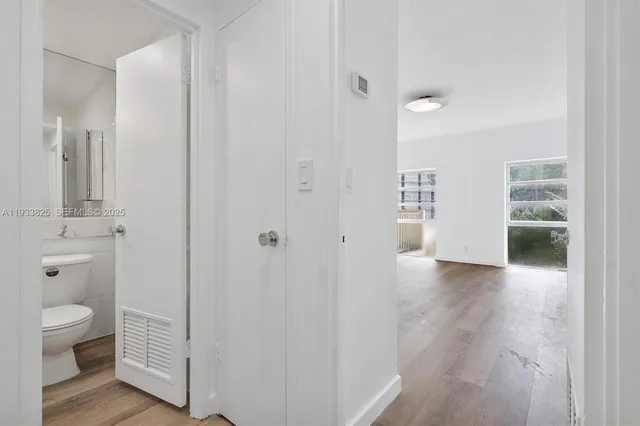 a view of bathroom with a toilet sink