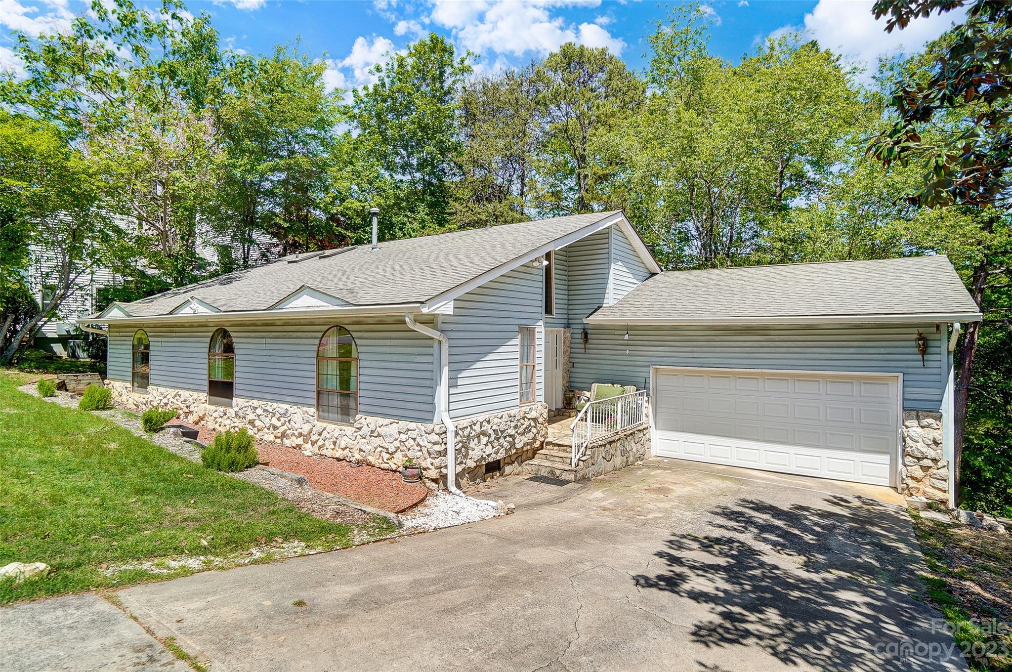 1205 Molokai Drive Tega Cay, SC 29708 - Photo 1 of 32 front view of a house with a yard