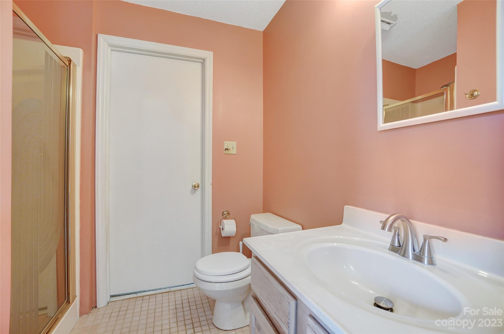 1205 Molokai Drive Tega Cay, SC 29708 - Photo 26 of 32 a bathroom with a sink and a toilet