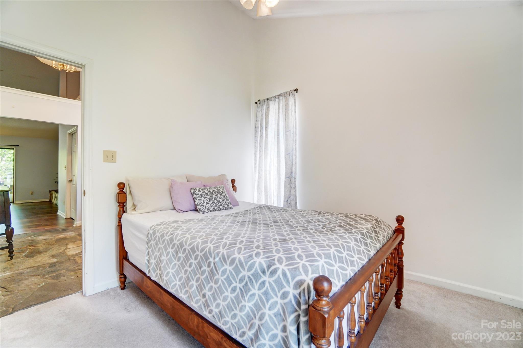 1205 Molokai Drive Tega Cay, SC 29708 - Photo 28 of 32 a bedroom with a bed and a window