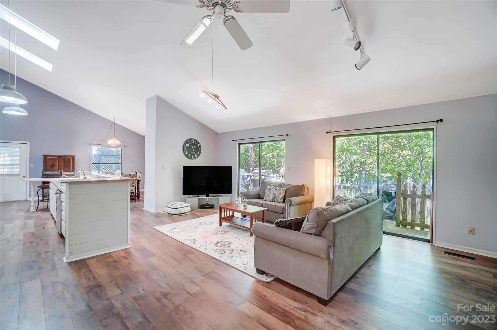 1205 Molokai Drive Tega Cay, SC 29708 - Photo 6 of 32 a living room with furniture and a flat screen tv
