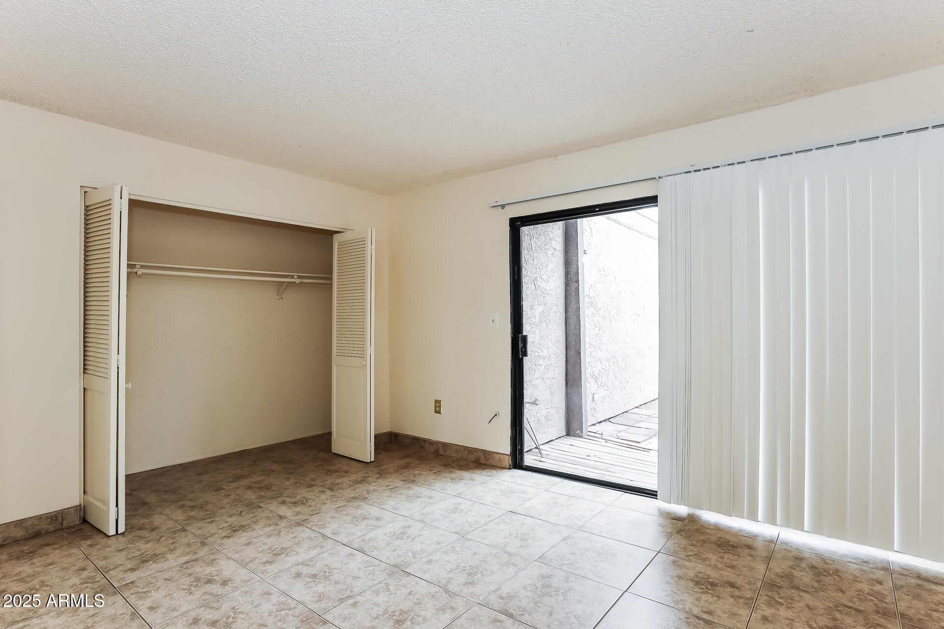 828 East Junction Street, Unit 828 Apache Junction, AZ 85119 - Photo 12 of 16 13-photo-Bedroom-dbf0a6bc-6dbe-4f08-82da