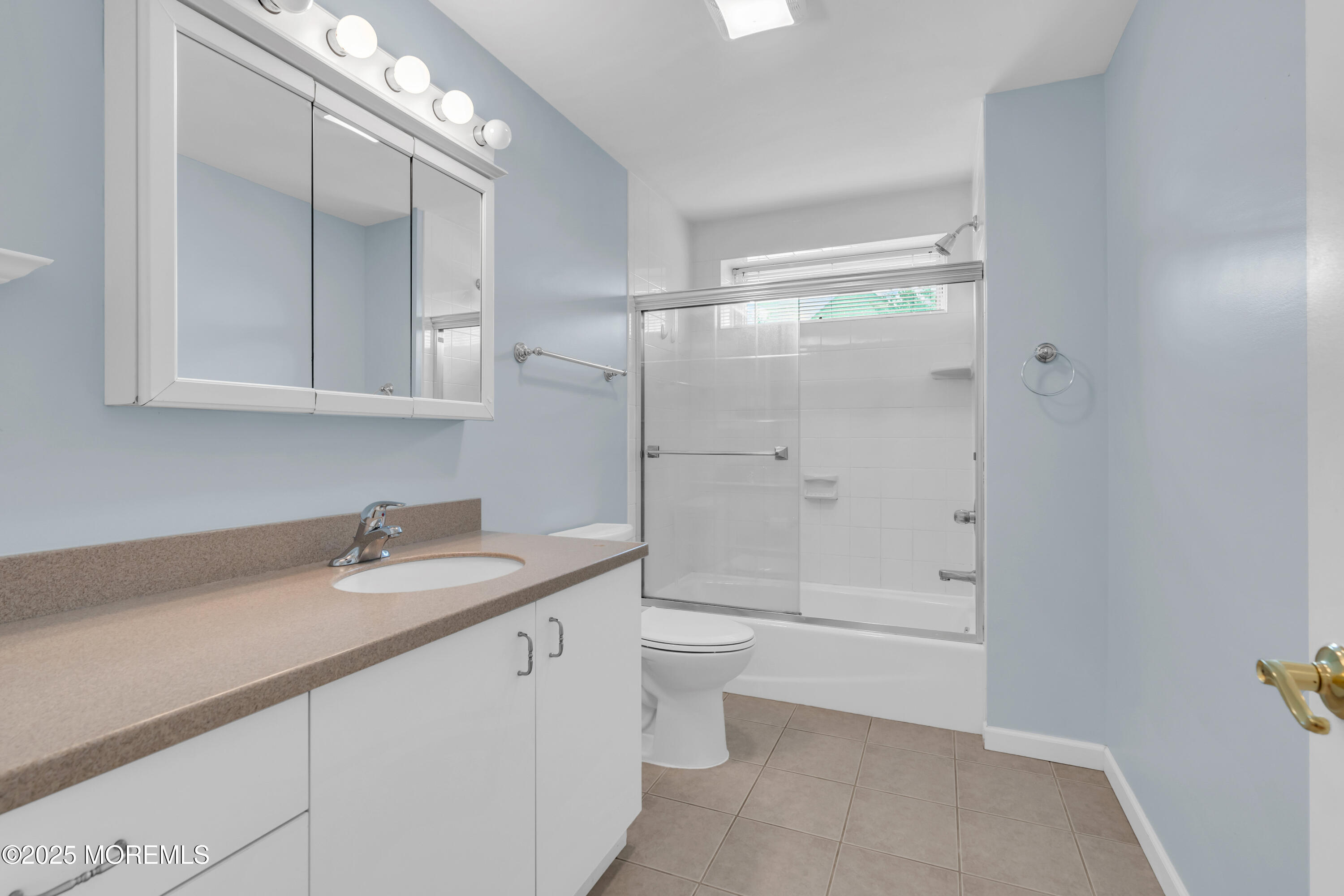 101 Main Street Farmingdale, NJ 07727 - Photo 15 of 24 a bathroom with a sink a toilet and shower