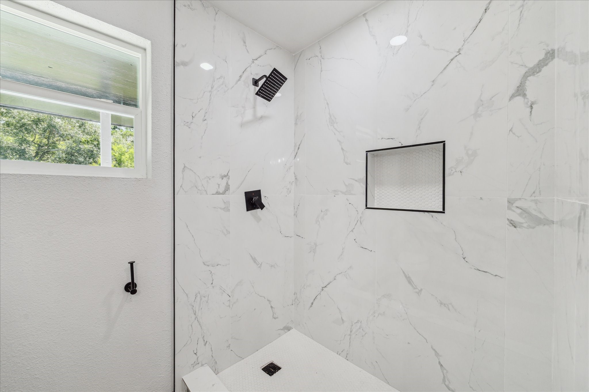 13812 Goodyear Road Dayton, TX 77535 - Photo 7 of 14 a bathroom with a shower