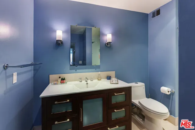 a bathroom with a sink and a toilet