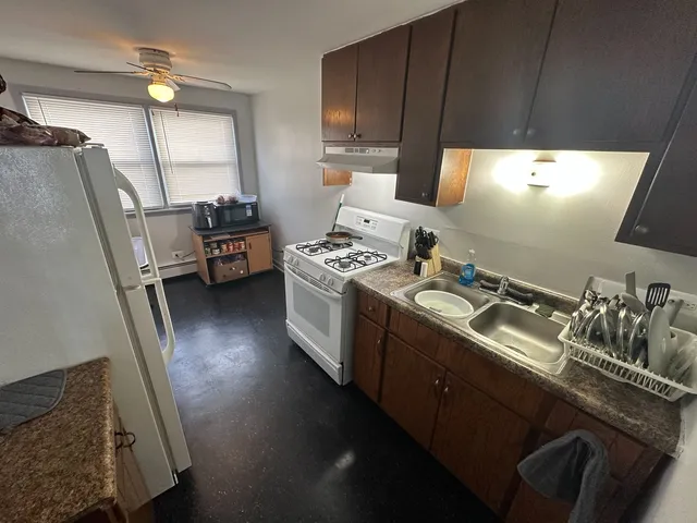 an aerial view of a city with ocean view