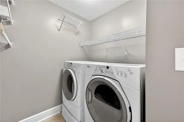 a utility room with dryer and washer