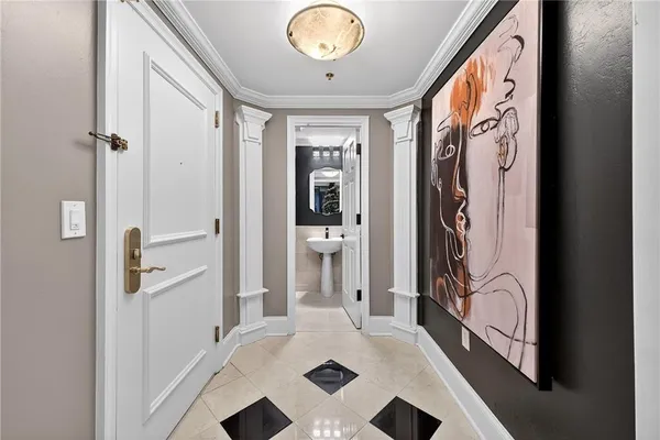 a view of a hallway to a bedroom