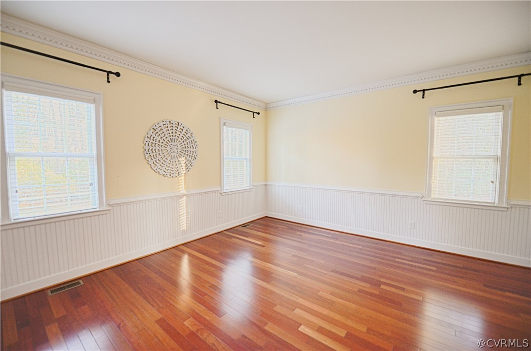 1781 Manakin Road Manakin-Sabot, VA 23103 - Photo 16 of 40 an empty room with wooden floor and windows