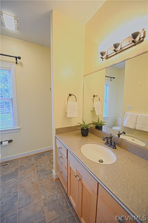 1781 Manakin Road Manakin-Sabot, VA 23103 - Photo 19 of 40 a bathroom with a granite countertop sink and a mirror