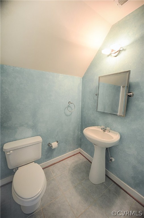 1781 Manakin Road Manakin-Sabot, VA 23103 - Photo 33 of 40 a white toilet sitting next to a bathroom sink