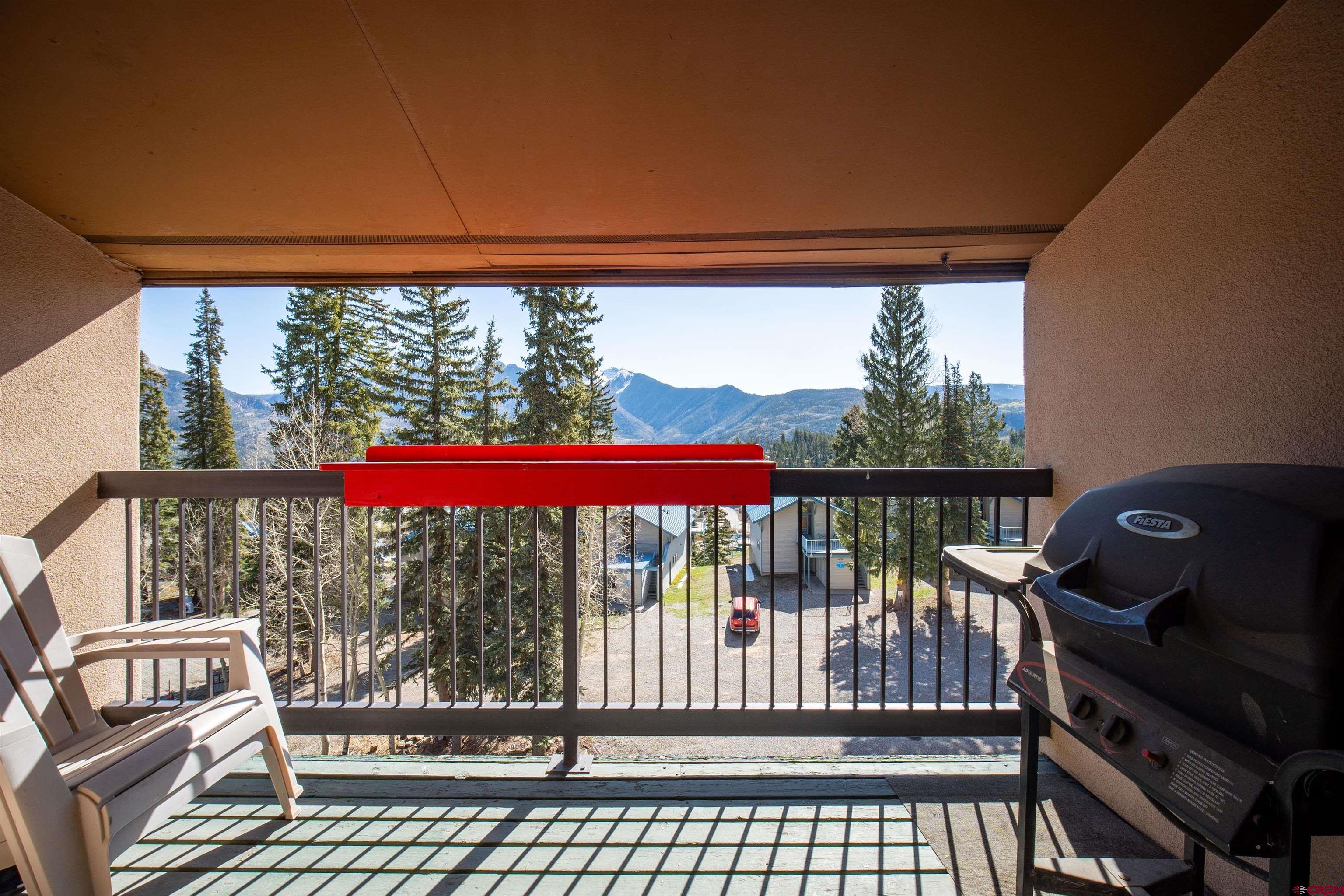 455 Sheol Street, Unit 320 Durango, CO 81301 - Photo 18 of 42 a view of a porch with a floor to ceiling window