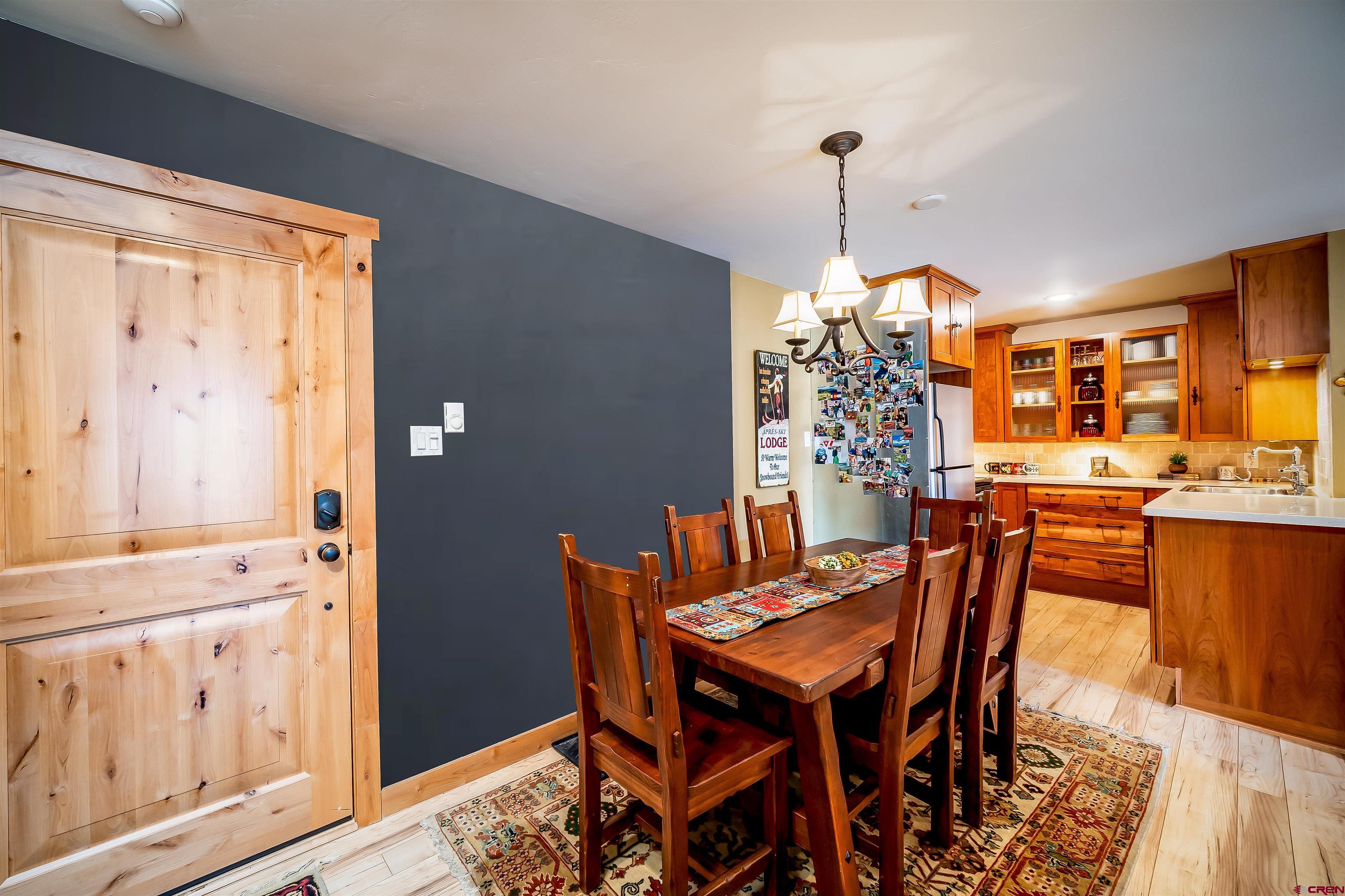 455 Sheol Street, Unit 320 Durango, CO 81301 - Photo 6 of 42 a view of a dining room with furniture window and wooden floor