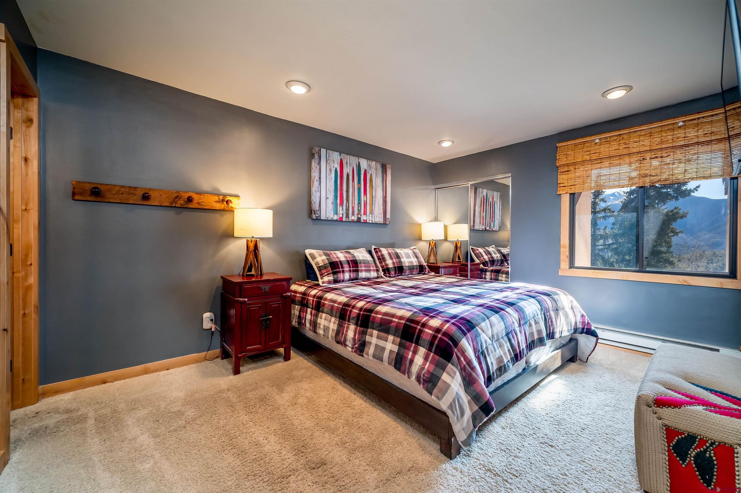 455 Sheol Street, Unit 320 Durango, CO 81301 - Photo 9 of 42 a bedroom with a bed and a window