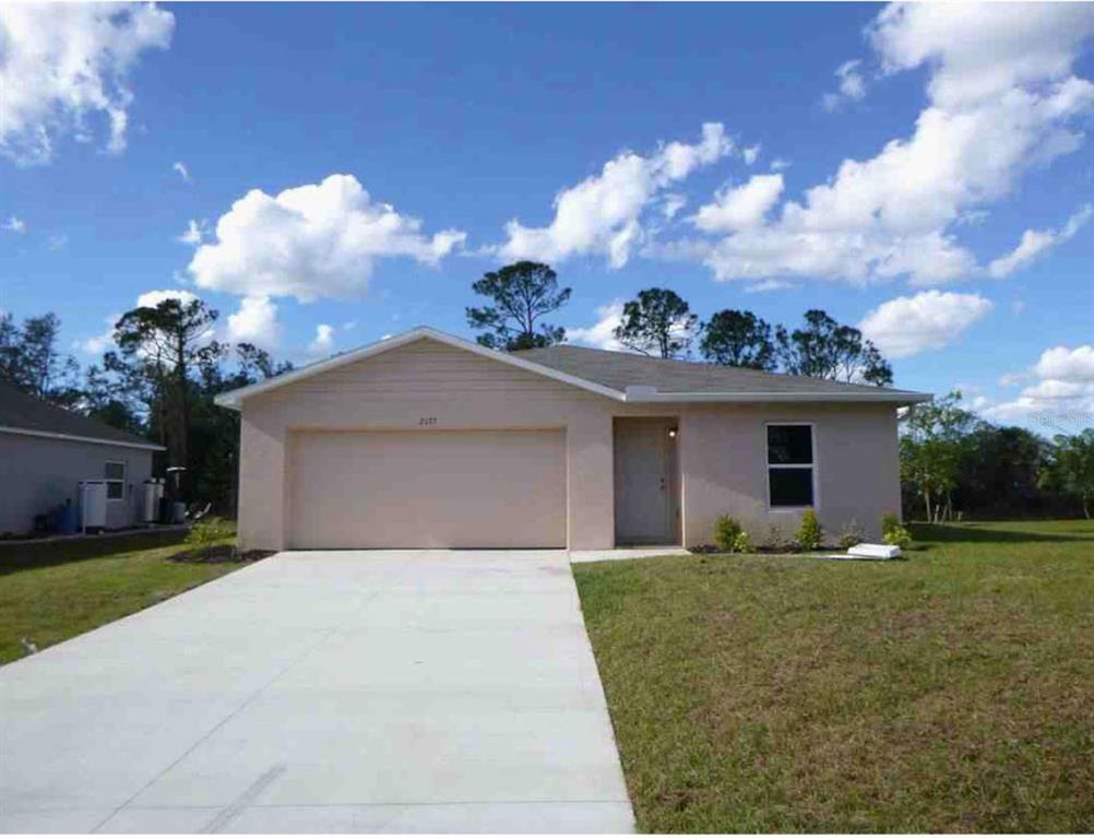 2173 Halblum Street North Port, FL 34288 - Photo 1 of 18 front view of a house with a yard