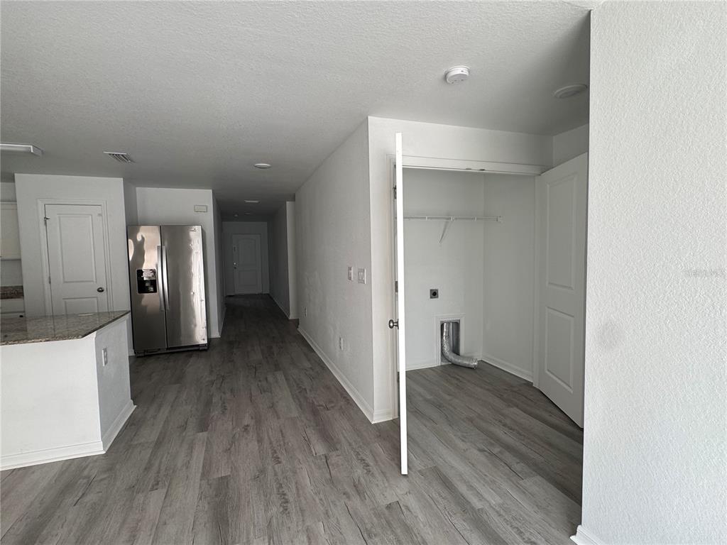 2173 Halblum Street North Port, FL 34288 - Photo 12 of 18 a view of a hallway with wooden floor