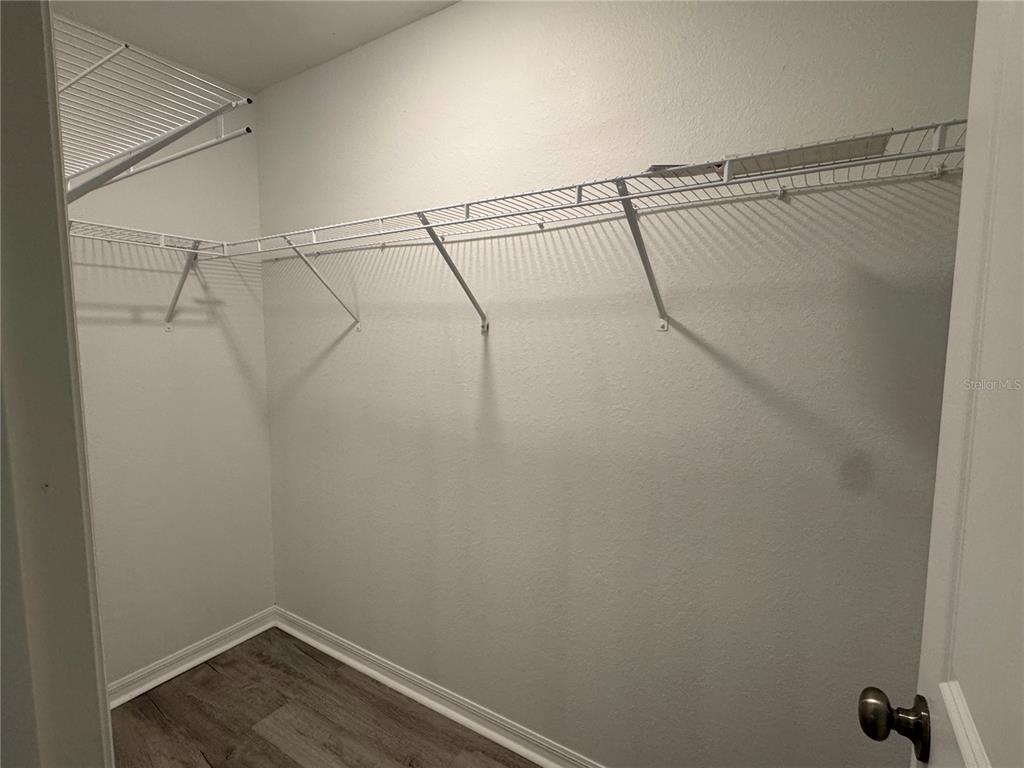 2173 Halblum Street North Port, FL 34288 - Photo 15 of 18 a view of a room with racks on the wall