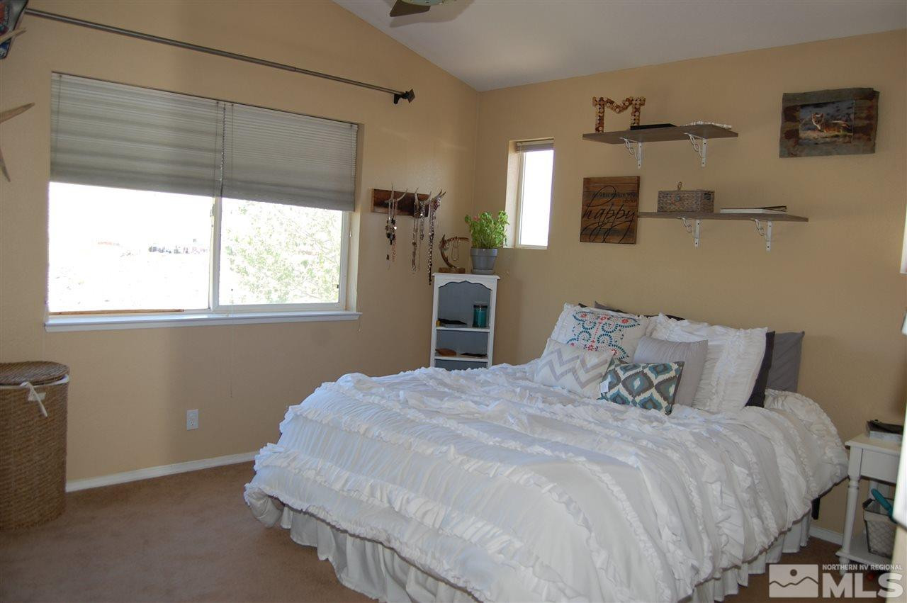 1378 Backer Way Reno, NV 89523 - Photo 14 of 25 a bedroom with a bed and a window