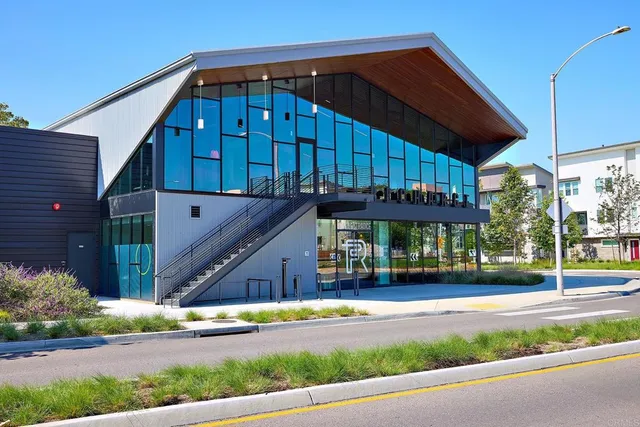 a front view of a building with garden