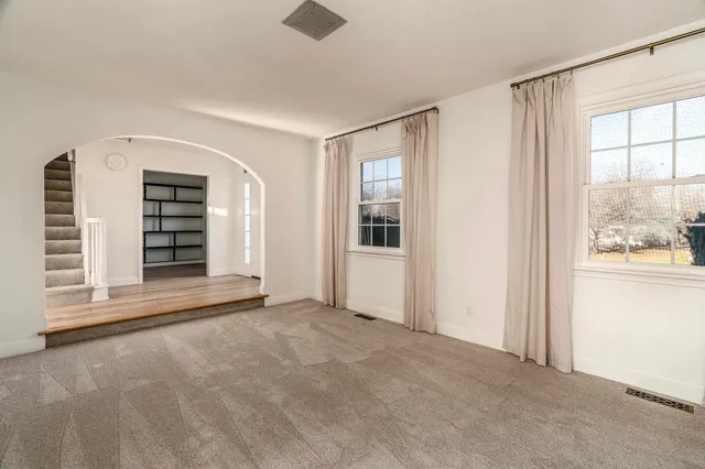 an empty room with windows