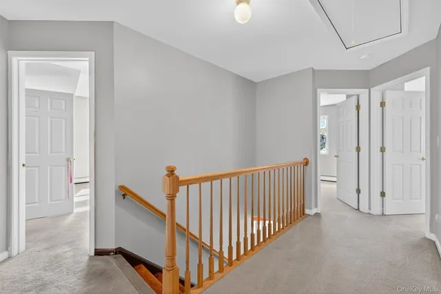 a view of a hallway with entryway