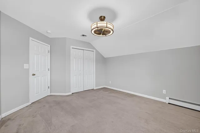 a bathroom with a sink double vanity and a shower