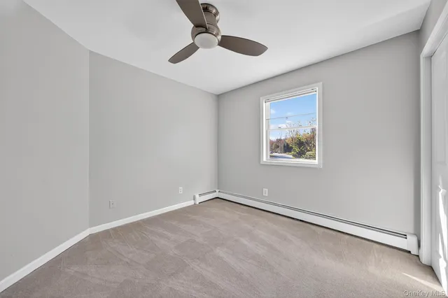 an aerial view of a house with outdoor space