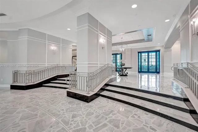 a view of a livingroom with furniture and kitchen floor