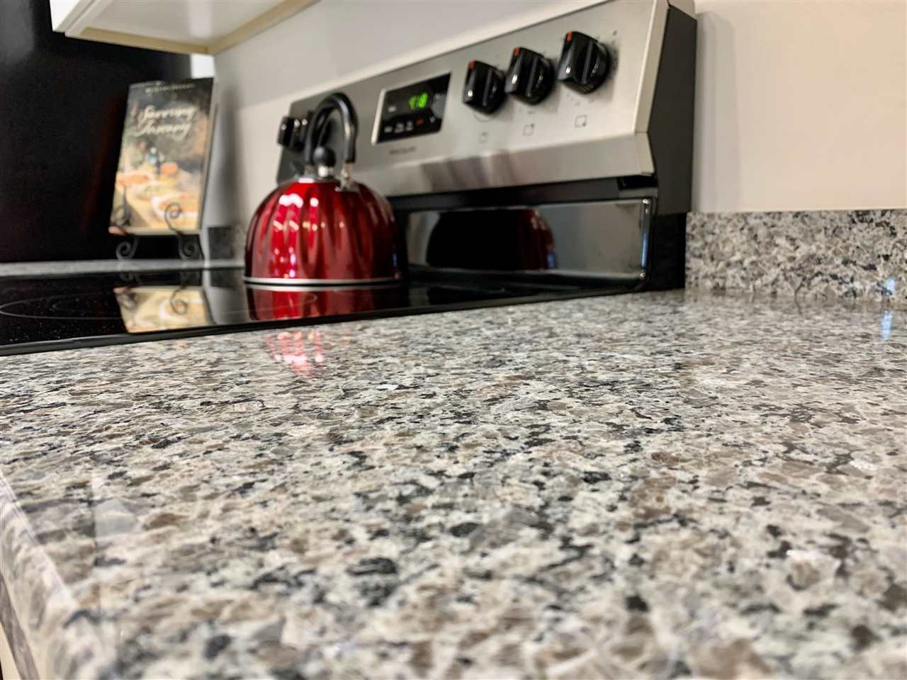 3803 Chimney Ridge Place, Unit 207 Durham, NC 27713 - Photo 11 of 27 This is such a nice color choice of granite and matches the appliances, cabinets, walls, and flooring. Granite Counters!