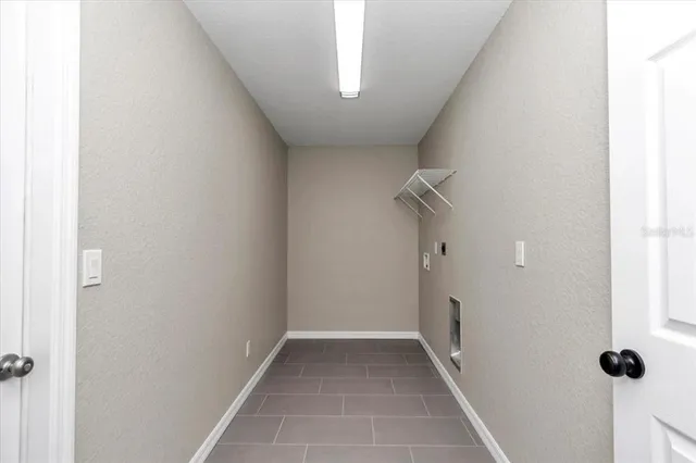 a view of a hallway with entryway