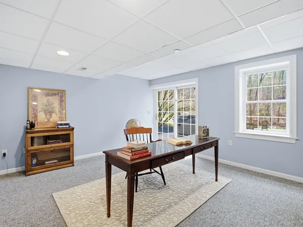a room with furniture and window