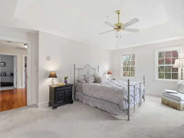 a bed room with bed and window