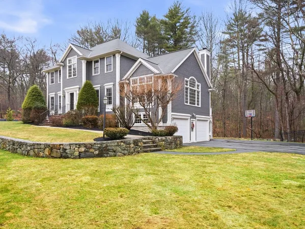 a front view of a house with swimming pool