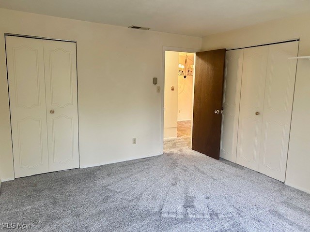 3068 Kent Road, Unit 211 Stow, OH 44224 - Photo 16 of 27 Unfurnished bedroom featuring carpet flooring