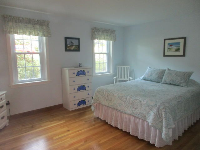 4 Stage Coach Road Harwich, MA 02645 - Photo 12 of 34 a bedroom with a bed and a window